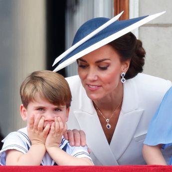 Prince Louis alongside his mum, Kate Middleton, on the Buckingham Palace balcony watching the RAF flypast
